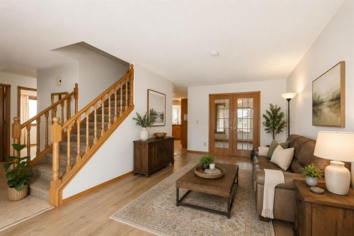 132 Scenic Cove Circle Nw, Calgary, AB - Indoor Photo Showing Living Room