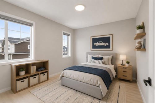 22 Edith Manor Nw, Calgary, AB - Indoor Photo Showing Bedroom