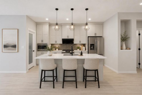 22 Edith Manor Nw, Calgary, AB - Indoor Photo Showing Kitchen With Upgraded Kitchen