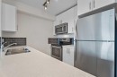 2404-181 Skyview Ranch Manor Ne, Calgary, AB  - Indoor Photo Showing Kitchen With Stainless Steel Kitchen With Double Sink 