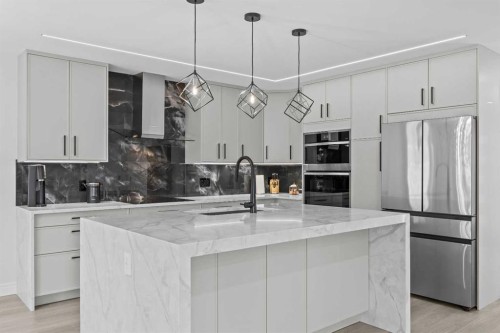 101 Bridlewood Street, Calgary, AB - Indoor Photo Showing Kitchen With Upgraded Kitchen