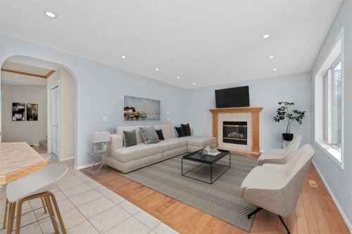 642 Citadel Drive Nw, Calgary, AB - Indoor Photo Showing Living Room With Fireplace