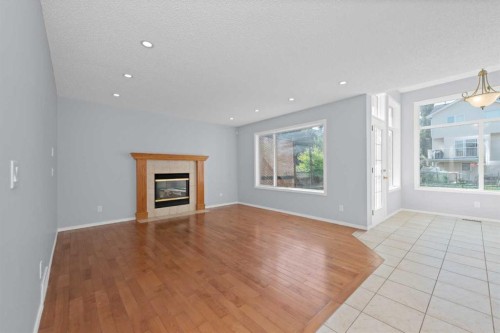 642 Citadel Drive Nw, Calgary, AB - Indoor Photo Showing Living Room With Fireplace