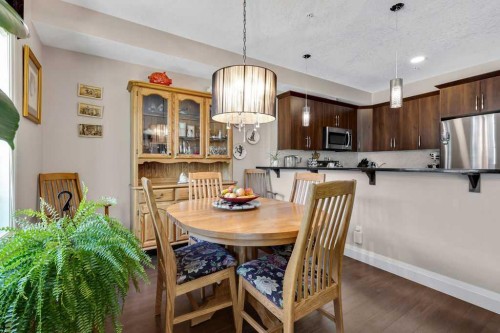 2110-15 Sunset Square, Cochrane, AB - Indoor Photo Showing Dining Room