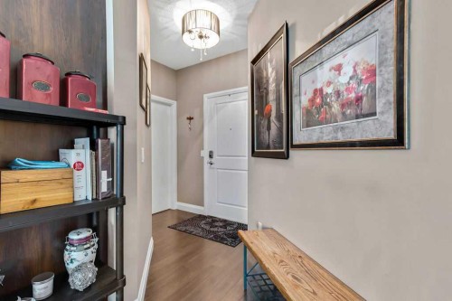 2110-15 Sunset Square, Cochrane, AB - Indoor Photo Showing Other Room