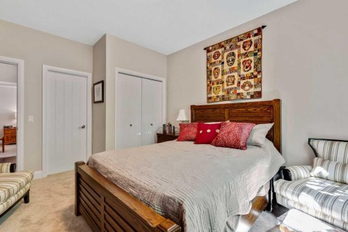 2110-15 Sunset Square, Cochrane, AB - Indoor Photo Showing Bedroom