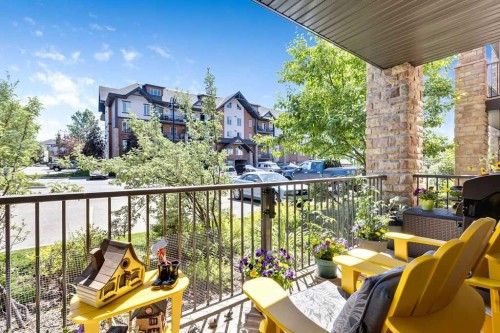2110-15 Sunset Square, Cochrane, AB - Outdoor With Exterior