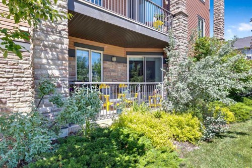 2110-15 Sunset Square, Cochrane, AB - Outdoor With Deck Patio Veranda