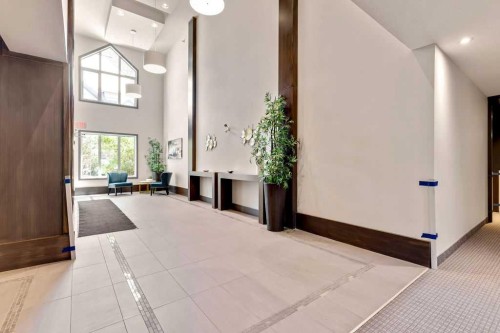 2110-15 Sunset Square, Cochrane, AB - Indoor Photo Showing Other Room