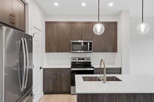 3085 Key Drive Sw, Airdrie, AB - Indoor Photo Showing Kitchen With Double Sink With Upgraded Kitchen