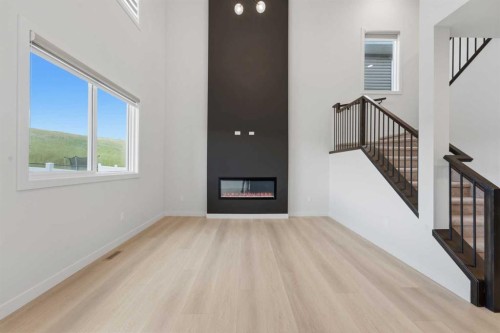 3085 Key Drive Sw, Airdrie, AB - Indoor With Fireplace