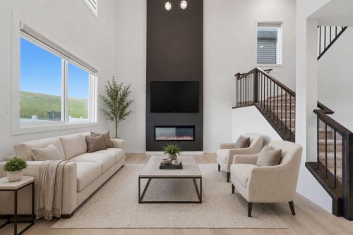3085 Key Drive Sw, Airdrie, AB - Indoor Photo Showing Living Room With Fireplace