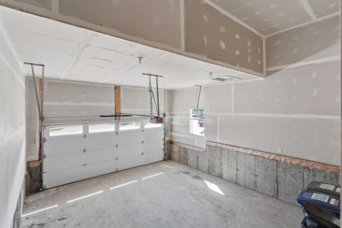 3085 Key Drive Sw, Airdrie, AB - Indoor Photo Showing Garage