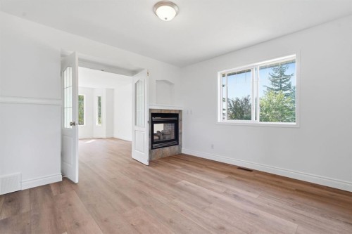 763 Stonehaven Drive, Carstairs, AB - Indoor With Fireplace