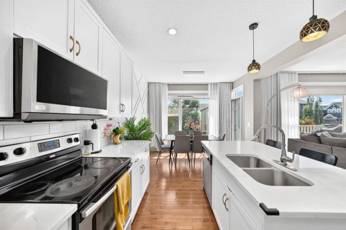 68 Sage Valley Drive Nw, Calgary, AB - Indoor Photo Showing Kitchen With Double Sink