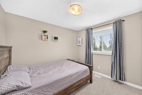 68 Sage Valley Drive Nw, Calgary, AB - Indoor Photo Showing Bedroom