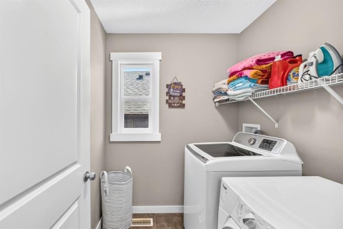 68 Sage Valley Drive Nw, Calgary, AB - Indoor Photo Showing Laundry Room