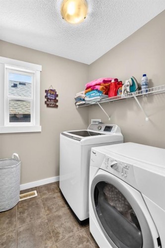 68 Sage Valley Drive Nw, Calgary, AB - Indoor Photo Showing Laundry Room