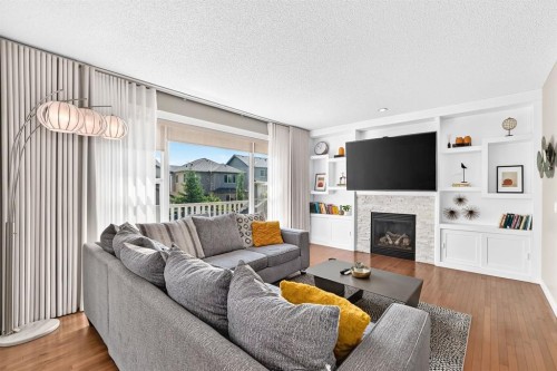 68 Sage Valley Drive Nw, Calgary, AB - Indoor Photo Showing Living Room With Fireplace