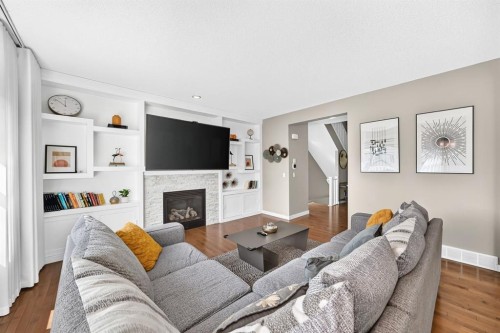 68 Sage Valley Drive Nw, Calgary, AB - Indoor Photo Showing Living Room With Fireplace