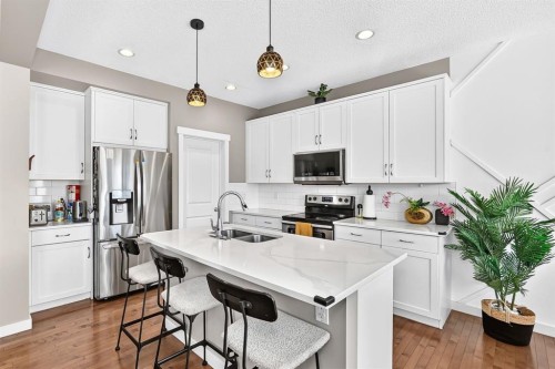 68 Sage Valley Drive Nw, Calgary, AB - Indoor Photo Showing Kitchen With Double Sink With Upgraded Kitchen