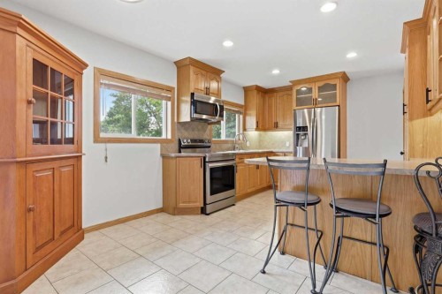 7403 20 Street Se, Calgary, AB - Indoor Photo Showing Kitchen With Stainless Steel Kitchen