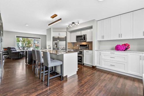 102 Panatella Hill Nw, Calgary, AB - Indoor Photo Showing Kitchen With Upgraded Kitchen