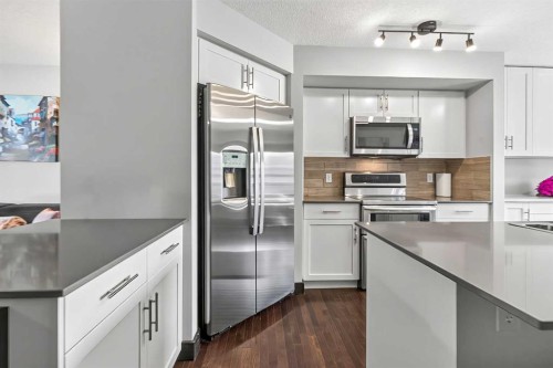 102 Panatella Hill Nw, Calgary, AB - Indoor Photo Showing Kitchen