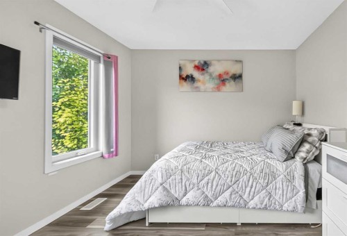 102 Panatella Hill Nw, Calgary, AB - Indoor Photo Showing Bedroom