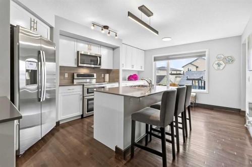 102 Panatella Hill Nw, Calgary, AB - Indoor Photo Showing Kitchen With Upgraded Kitchen