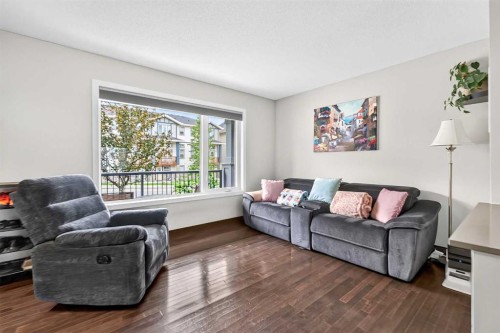 102 Panatella Hill Nw, Calgary, AB - Indoor Photo Showing Living Room