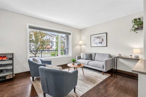 102 Panatella Hill Nw, Calgary, AB - Indoor Photo Showing Living Room