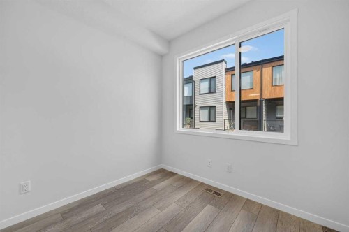 405-81 Midtown Boulevard Sw, Airdrie, AB - Indoor Photo Showing Other Room