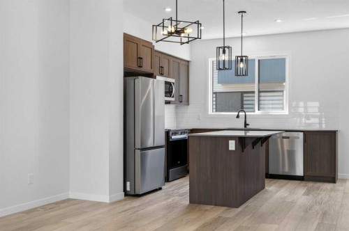 405-81 Midtown Boulevard Sw, Airdrie, AB - Indoor Photo Showing Kitchen With Upgraded Kitchen