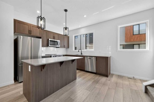 405-81 Midtown Boulevard Sw, Airdrie, AB - Indoor Photo Showing Kitchen With Upgraded Kitchen