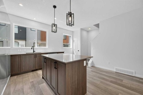 405-81 Midtown Boulevard Sw, Airdrie, AB - Indoor Photo Showing Kitchen With Upgraded Kitchen