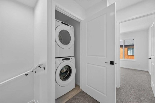 405-81 Midtown Boulevard Sw, Airdrie, AB - Indoor Photo Showing Laundry Room
