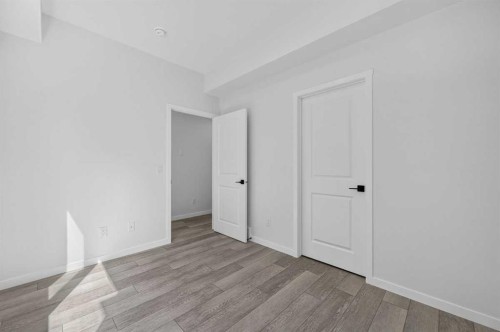 405-81 Midtown Boulevard Sw, Airdrie, AB - Indoor Photo Showing Other Room