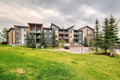 211-3950 46 Avenue Nw, Calgary, AB - Outdoor With Balcony With Facade