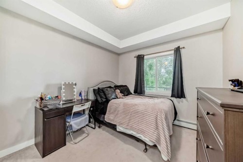 211-3950 46 Avenue Nw, Calgary, AB - Indoor Photo Showing Bedroom