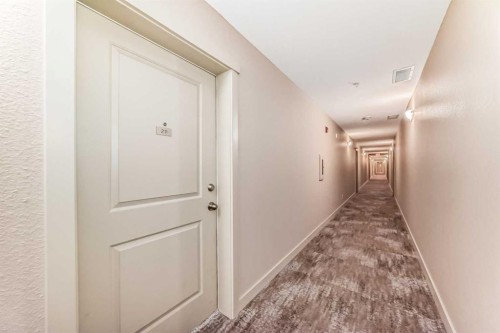 211-3950 46 Avenue Nw, Calgary, AB - Indoor Photo Showing Other Room