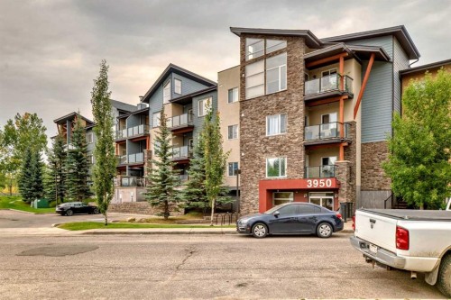 211-3950 46 Avenue Nw, Calgary, AB - Outdoor With Balcony With Facade