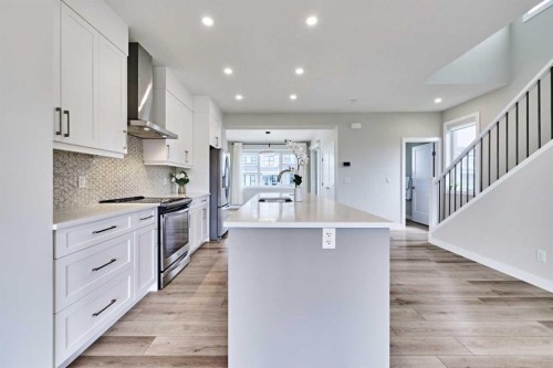 102 Crestridge Common Sw, Calgary, AB - Indoor Photo Showing Kitchen With Upgraded Kitchen