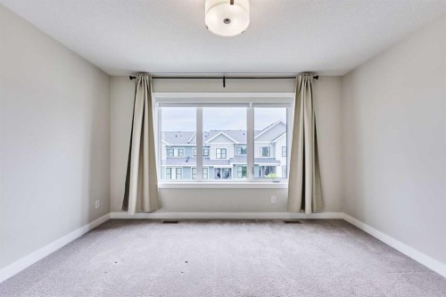 102 Crestridge Common Sw, Calgary, AB - Indoor Photo Showing Other Room