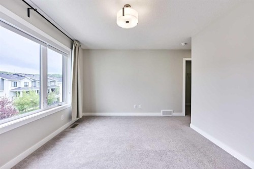 102 Crestridge Common Sw, Calgary, AB - Indoor Photo Showing Other Room