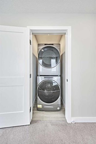 102 Crestridge Common Sw, Calgary, AB - Indoor Photo Showing Laundry Room