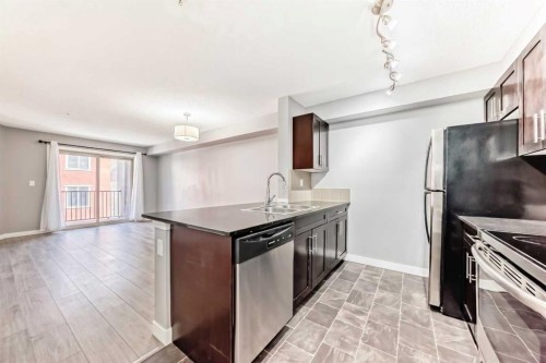 4304-403 Mackenzie Way SW Airdrie, AB T4B 3V7
