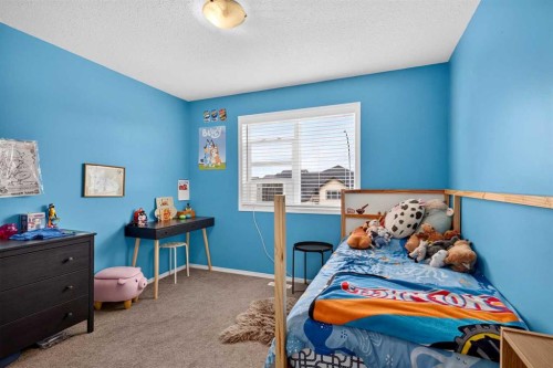 78 Sandpiper Drive, Didsbury, AB - Indoor Photo Showing Bedroom