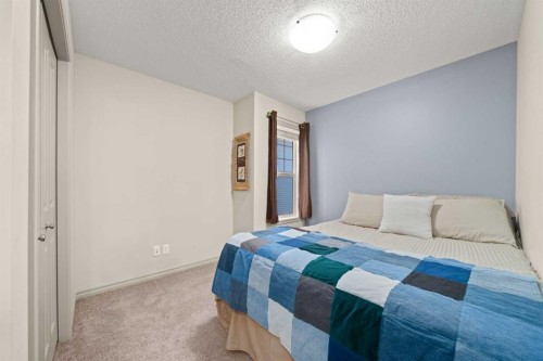 277 Brightonwoods Gardens Se, Calgary, AB - Indoor Photo Showing Bedroom