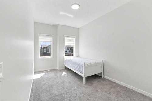 26 Homestead Circle Ne, Calgary, AB - Indoor Photo Showing Bedroom